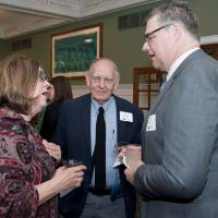 people talking with winner